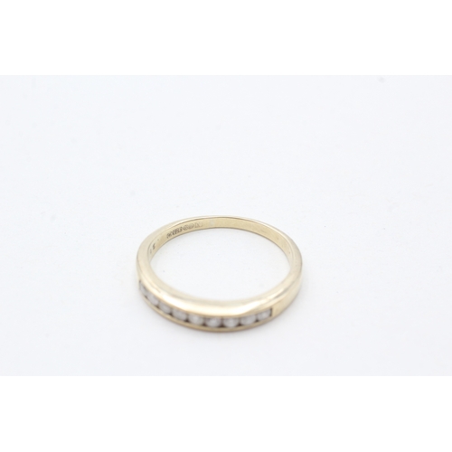 236 - 9ct gold diamond half eternity ring (1.7g) Size L