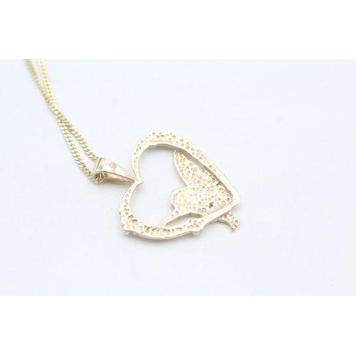 247 - 9ct gold fairy heart pendant on chain (2.6g)