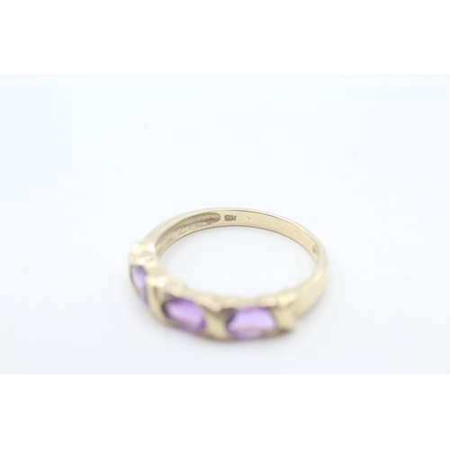 26 - 9ct gold three stone amethyst ring (2.2g) Size Q