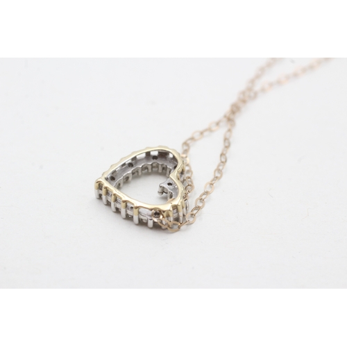 30 - 9ct gold diamond heart shape pendant necklace (1.4g)