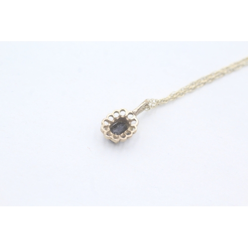 37 - 9ct gold sapphire pendant on chain (1.3g)