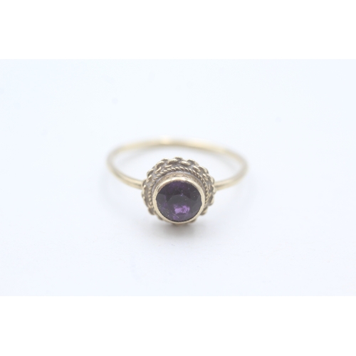 39 - 9ct gold single amethyst stone set ring (1.7g) AS SEEN - MISSHAPEN Size N