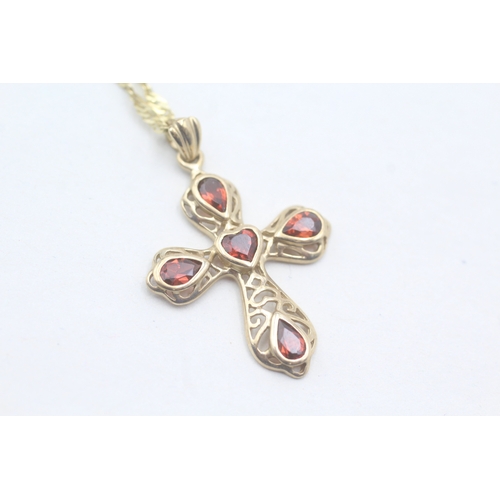 49 - 9ct gold and garnet cross pendant on chain (3.2g)