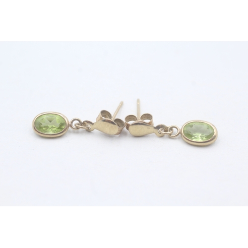 58 - 9ct gold and peridot drop stud earrings (0.6g)