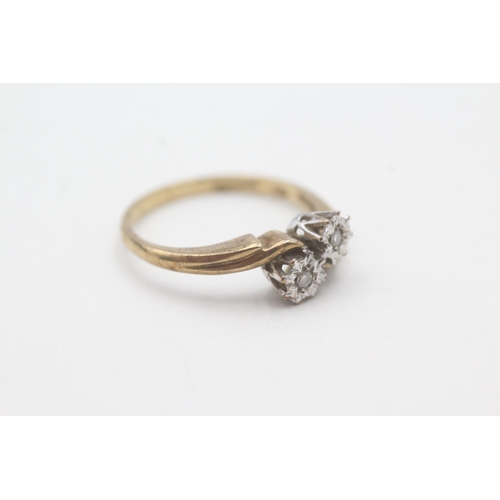 59 - 9ct gold two stone diamond ring (2.4g) Size P