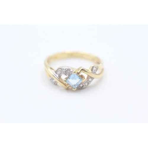 61 - 18ct gold blue topaz and cubic zirconia ring (3.1g) Size O