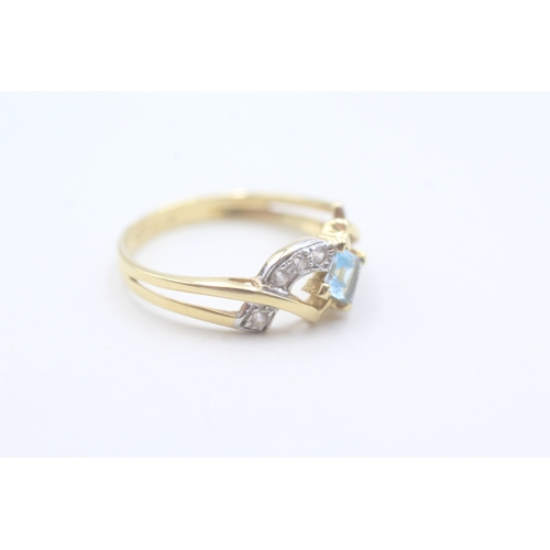 61 - 18ct gold blue topaz and cubic zirconia ring (3.1g) Size O