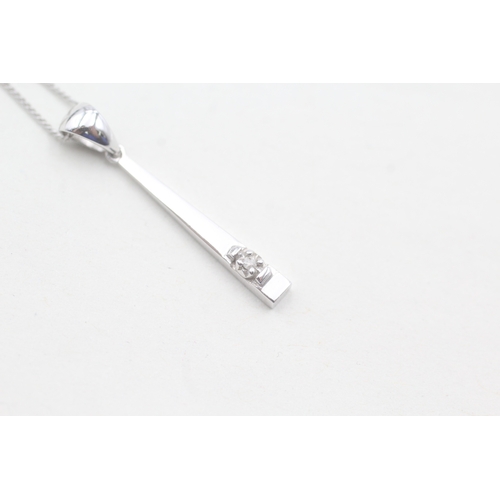 70 - 9ct gold diamond pendant on chain (1.4g)