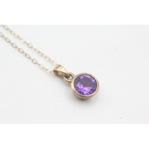 72 - 9ct gold amethyst pendant on chain (1.6g)