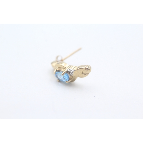 81 - 9ct gold blue topaz and diamond stud earrings (2.7g)