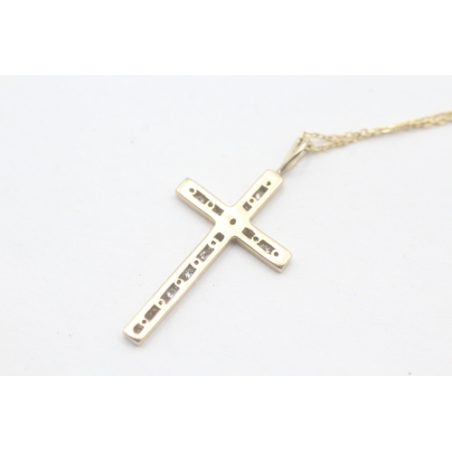 86 - 9ct gold diamond cross pendant on chain (2g)