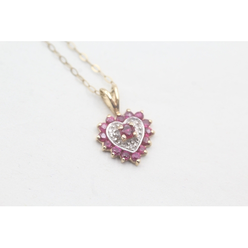 89 - 9ct gold ruby and diamond heart shaped pendant on chain (1.1g)