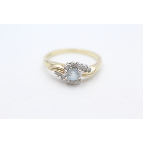 225 - 9ct gold blue topaz & diamond dress ring (2.1g) Size O