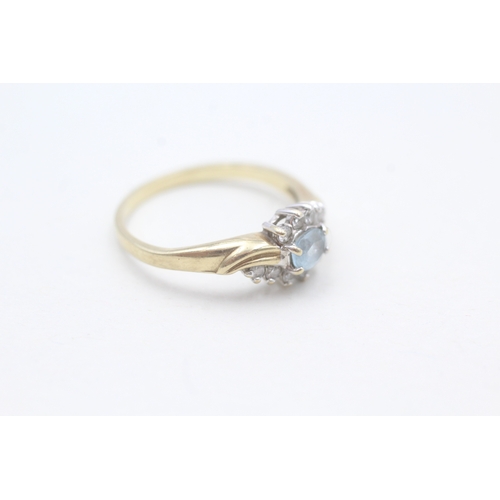 225 - 9ct gold blue topaz & diamond dress ring (2.1g) Size O