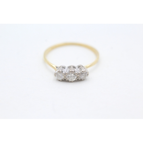 227 - 18ct gold diamond & cubic zirconia trilogy ring (1.7g)