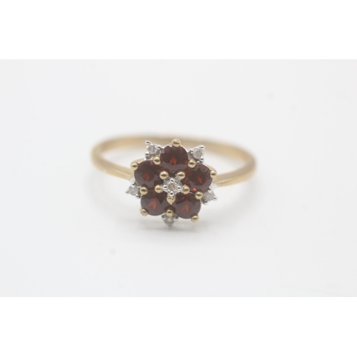 233 - 9ct gold diamond and garnet flower cluster ring (2.7g) Size U 1/2