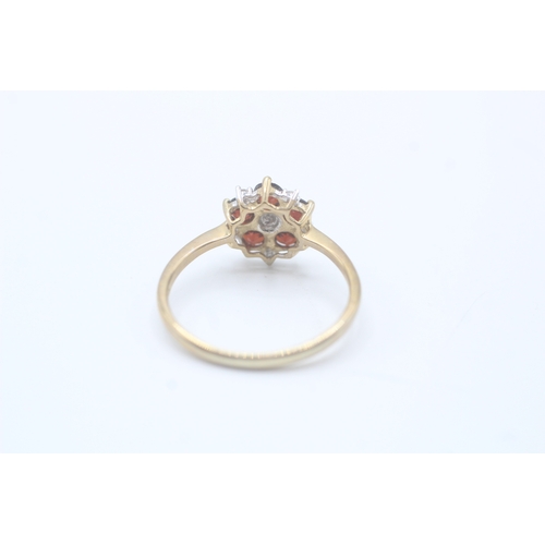 233 - 9ct gold diamond and garnet flower cluster ring (2.7g) Size U 1/2