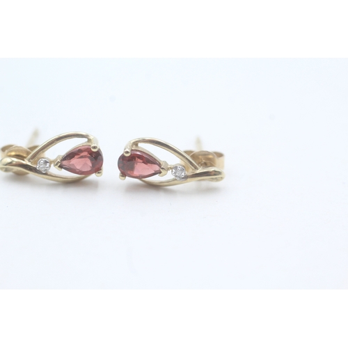 250 - 9ct gold garnet and diamond drop stud earrings (1.2g)