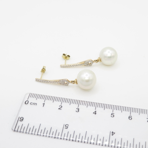 12 - 9ct gold faux pearl & white gemstone drop earrings (7.2g)