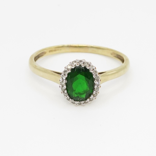 48 - 9ct gold diamond & diopside oval halo ring (2.4g) Size X 1/2