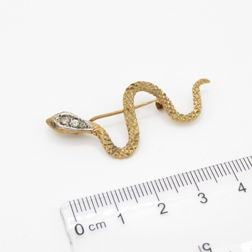 50 - 9ct gold ruby and paste snake brooch (2.7g)