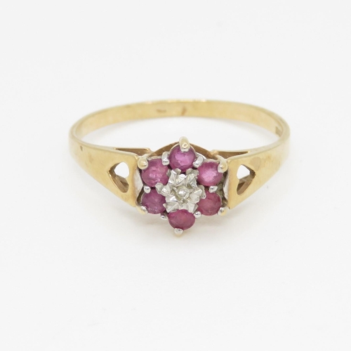 52 - 9ct gold diamond and ruby flower cluster ring (1.2g) Size M