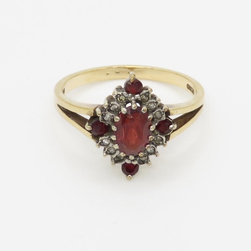 58 - 9ct gold garnet & diamond dress ring (2.9g) Size P