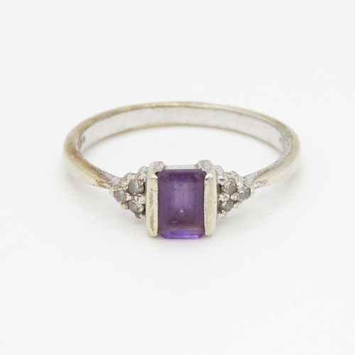 72 - 9ct gold amethyst with diamond shoulder set ring (2.5g) Size O