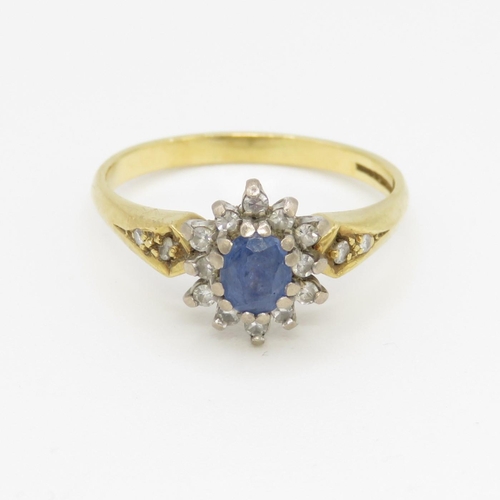 77 - 18ct gold sapphire and diamond halo ring (3.9g) Size Q