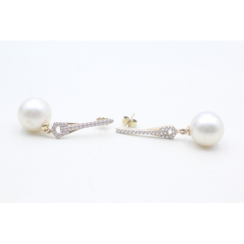 12 - 9ct gold faux pearl & white gemstone drop earrings (7.2g)