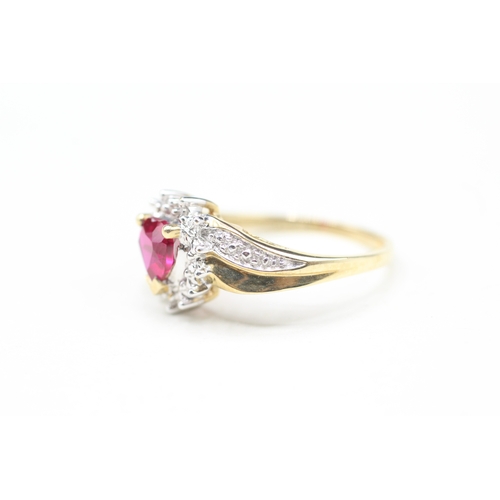 16 - 9ct gold diamond and red gemstone heart ring (2.7g) Size P