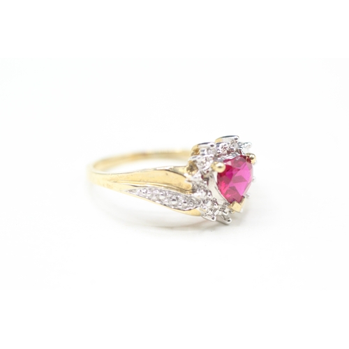 16 - 9ct gold diamond and red gemstone heart ring (2.7g) Size P