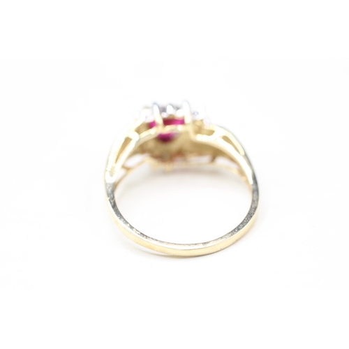 16 - 9ct gold diamond and red gemstone heart ring (2.7g) Size P