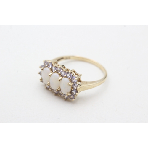 19 - 9ct gold opal & tanzanite dress ring (2.6g) Size P