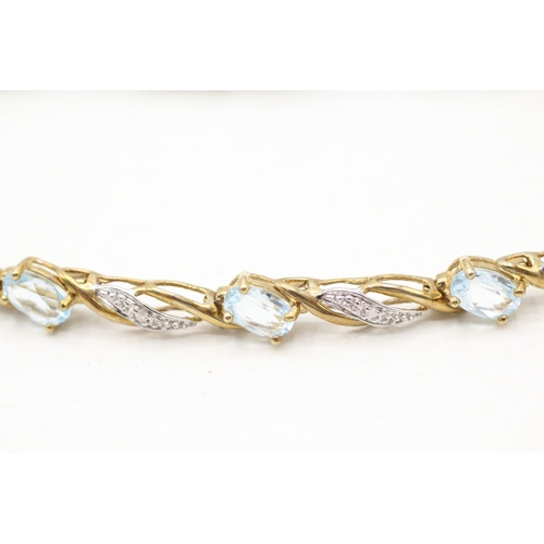 22 - 9ct gold blue topaz & diamond bracelet (7g)