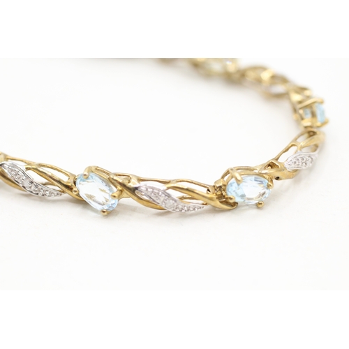 22 - 9ct gold blue topaz & diamond bracelet (7g)