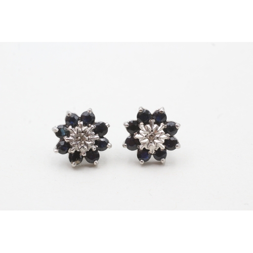 28 - 9ct white gold diamond & sapphire floral cluster stud earrings (2.5g)