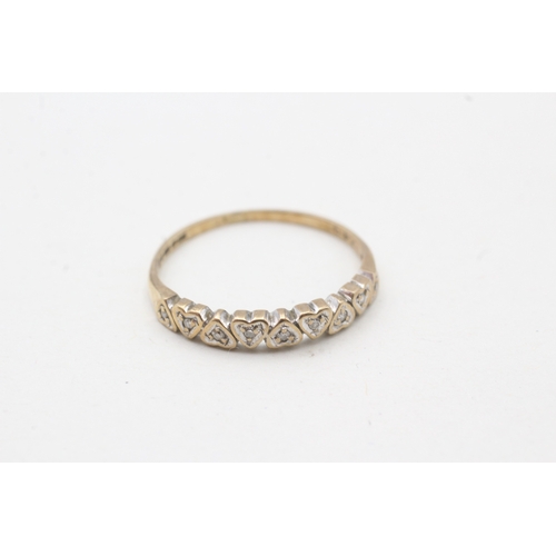 37 - 9ct gold diamond heart shape half eternity ring (1.1g) Size N