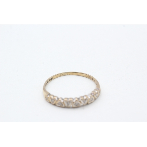 37 - 9ct gold diamond heart shape half eternity ring (1.1g) Size N