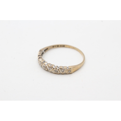 37 - 9ct gold diamond heart shape half eternity ring (1.1g) Size N