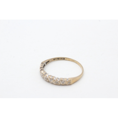 37 - 9ct gold diamond heart shape half eternity ring (1.1g) Size N