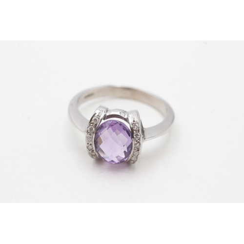 42 - 18ct white gold amethyst single stone ring with diamond highlight (5.4g) Size S