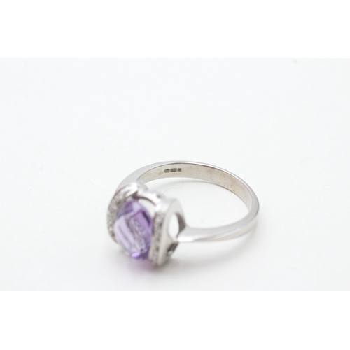 42 - 18ct white gold amethyst single stone ring with diamond highlight (5.4g) Size S