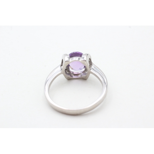 42 - 18ct white gold amethyst single stone ring with diamond highlight (5.4g) Size S