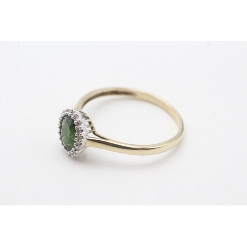 48 - 9ct gold diamond & diopside oval halo ring (2.4g) Size X 1/2