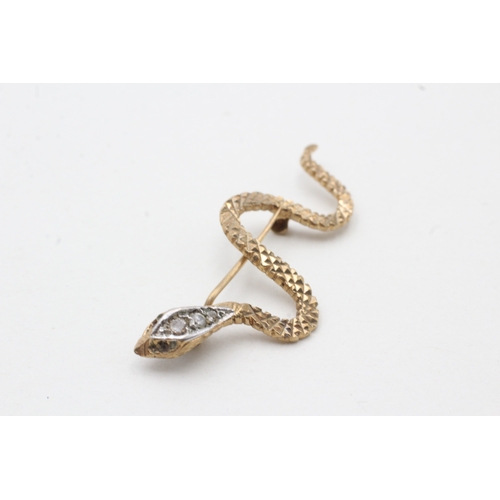 50 - 9ct gold ruby and paste snake brooch (2.7g)