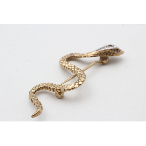 50 - 9ct gold ruby and paste snake brooch (2.7g)