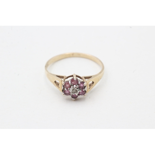 52 - 9ct gold diamond and ruby flower cluster ring (1.2g) Size M