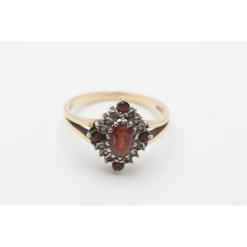 58 - 9ct gold garnet & diamond dress ring (2.9g) Size P