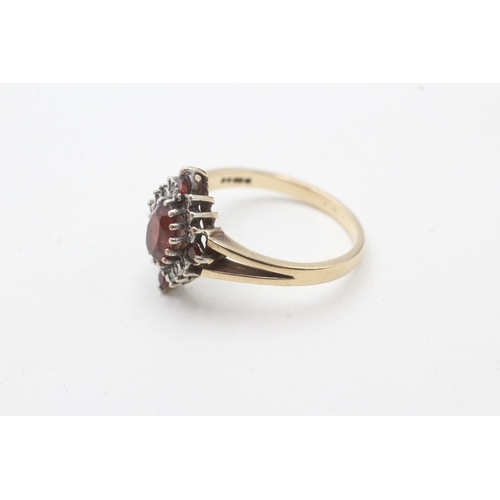 58 - 9ct gold garnet & diamond dress ring (2.9g) Size P